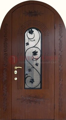 Качественная входная арочная дверь со стеклом и ковкой ДА-18 в Тихвине