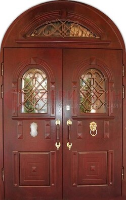 Стальная арочная дверь со стеклом и ковкой ДА-30 в дом из кирпича в Тихвине