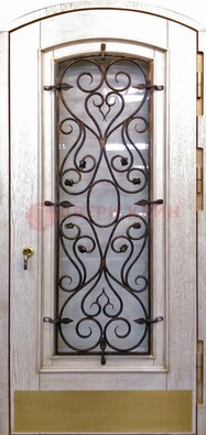 Железная дверь Винорит в форме арки со стеклом и ковкой ДА-53 в Тихвине