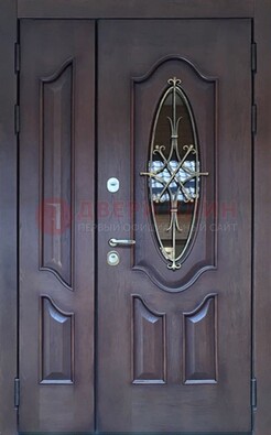 Темная металлическая дверь Винорит со стеклом и ковкой ДСК-239 в Тихвине
