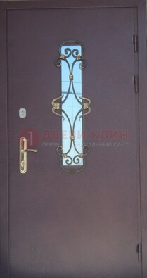 Металлическая дверь со стеклом и ковкой ДСК-77 в Тихвине